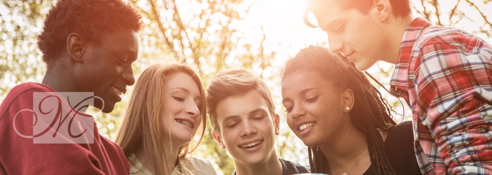 Ortho For Teens header - Teens Smiling Outside